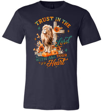 Load image into Gallery viewer, Navy blue t-shirt with a lion, cross, and pumpkin design on a white background