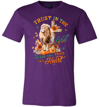 Load image into Gallery viewer, Purple t-shirt with a lion, cross, and pumpkin design on a white background