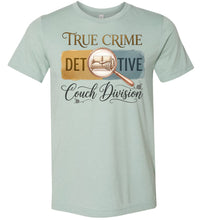 Load image into Gallery viewer, Light green t-shirt with 'True Crime Detective Couch Division' text and graphic on a white background