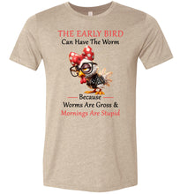Load image into Gallery viewer, Beige t-shirt with a cartoon chicken wearing a bow and glasses, and humorous text on a white background.