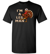 Load image into Gallery viewer, Black t-shirt with a turkey graphic and text &#39;I&#39;m a Leg Man&#39; on a white background