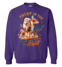 Load image into Gallery viewer, Purple sweatshirt with a lion, cross, and floral design on a white background