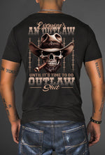 Load image into Gallery viewer, Black t-shirt with a graphic design featuring a skull wearing a cowboy hat and smoking a cigar, with text on the back.