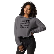 Load image into Gallery viewer, Woman wearing a gray hoodie with &#39;Cheer is my favorite season&#39; text on a white background